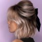 Voluminous-Half-Updo-with-Soft-Waves.jpg